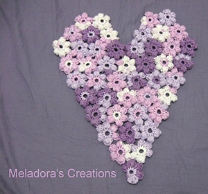 Puff Flower Heart Motif by @MeladoraCrochet | via Be Mine Décor - A LOVE Round Up by @beckastreasures | #crochet #pattern #hearts #kisses #valentines #love
