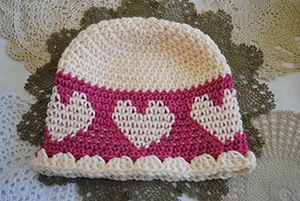 Hearts Go Round by @Cre8tionCrochet | via I Heart Hats - A LOVE Round Up by @beckastreasures | #crochet #pattern #hearts #kisses #valentines #love