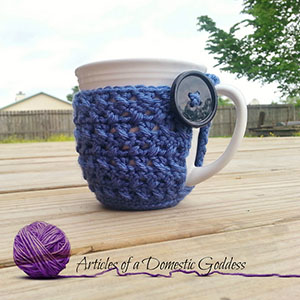 Textured Coffee Mug Cozy - Free Crochet Pattern by @ArtofaDG | Featured at Articles of a Domestic Goddess - Sponsor Spotlight Round Up via @beckastreasures | #fallintochristmas2016 #crochetcontest #spotlight #crochet #roundup
