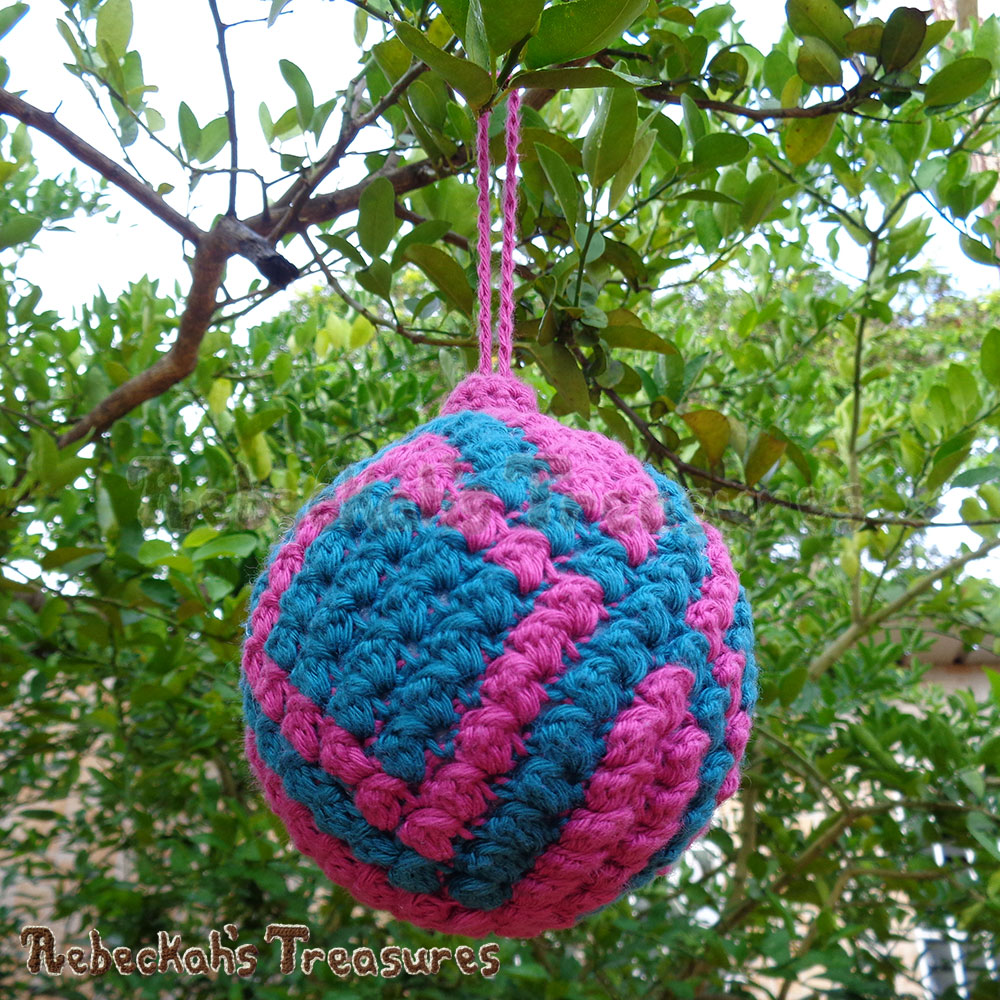Diamonds Bobble Bauble on a lemon tree! | Amigurumi Crochet Pattern by @beckastreasures | Written pattern + photo tutorials too | Available to purchase in my #Ravelry & Website shops - Get your copy today! | #crochet #pattern #amigurumi #christmas #bauble #ornament #diamonds #RebeckahsTreasures
