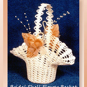 Bridal Shell Flower Basket - Crochet Pattern by @crochetmemories Featured at Crochet Memories - Sponsor Spotlight Round Up via @beckastreasures | #fallintochristmas2016 #crochetcontest #spotlight #crochet #roundup