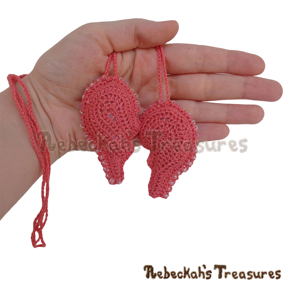 Both Necklace Heart Halves in the Palm of My Hand! | Dusty Rose Jumbo Broken Hearts Necklace Set Story | A Crochet Pattern by @beckastreasures for @getstuffed | Is it an amigurumi or an appliqué? Will it be a necklace, a fob or a pillow? Are the hearts separated to share with your besties or kept whole to show broken hearts can be mended? YOU get to decide!!! | #crochet #pattern #brokenheart #valentine #heart #amigurumi #appliqué #necklace #fob #pillow