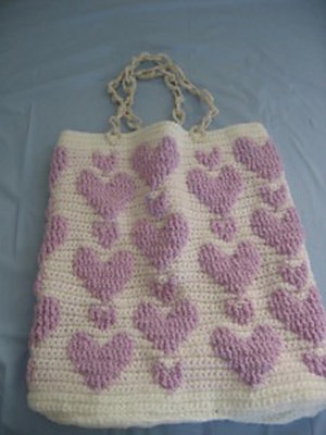 Lavender Raised Stitch Hearts Purse by @LivingPlastic | via I Heart Bags & Baskets - A LOVE Round Up by @beckastreasures | #crochet #pattern #hearts #kisses #valentines #love