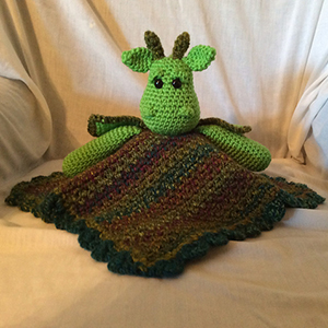 Dragon Lovey or Security Blanket - Crochet Pattern by @lisakingsley4 | Featured at Lisa Kingsley Designs - Sponsor Spotlight Round Up via @beckastreasures | #fallintochristmas2016 #crochetcontest #spotlight #crochet #roundup