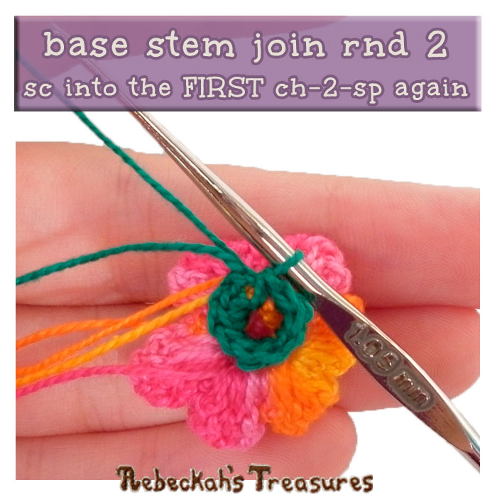 WIP Picture 19 - rnd 2 | Crocheting the Rose's Stem Base via @beckastreasures | FREE Pencil Topper / Finger Puppet Crochet Pattern! | Visit www.rebeckahstreasures.com! #crochetrose #penciltopper #rose