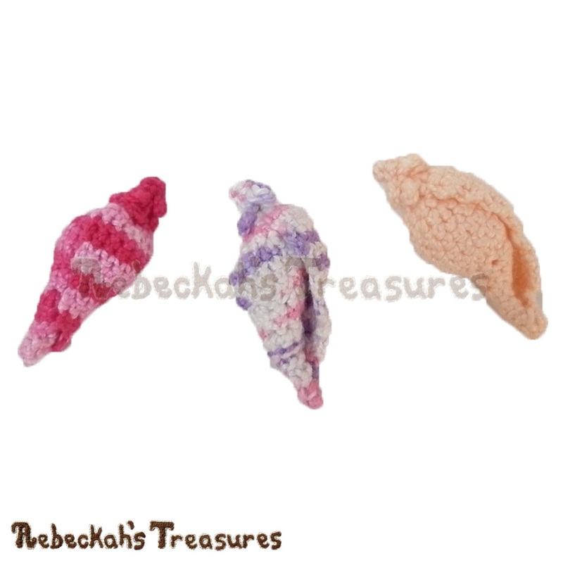 Spiral Conch Shells in Cotton Thread Size 10 | FREE crochet pattern by @beckastreasures | Do you scavenge beaches for precious seashells? Keep memories of summer fun near you always with this gorgeous Spiral Conch Shell! Visit www.rebeckahstreasures.com #seashell #crochet #spiralconchshell #shell #treasure